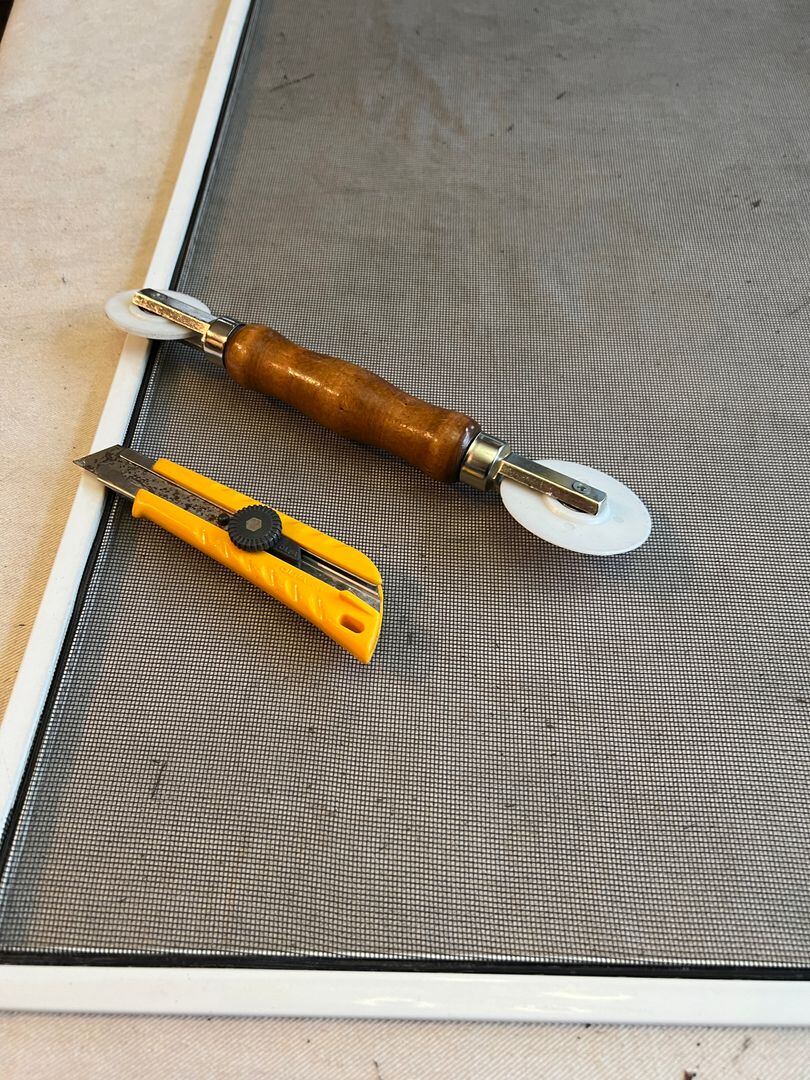 Window screen mesh repair.