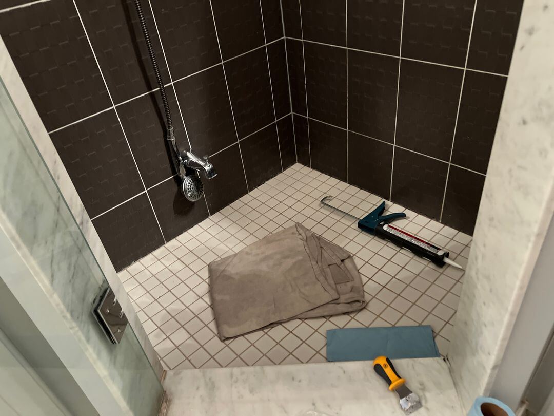 Tile, grout, and caulking restoration.