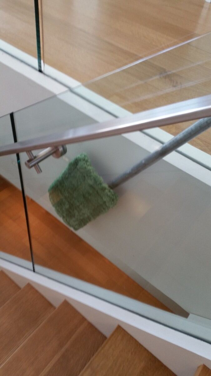 Glass railing cleaning.
